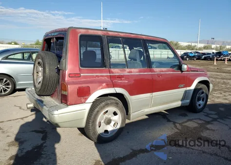 1997 Suzuki Sidekick Sport Js из США, поврежденный, VIN JS3TE21V6V4100299